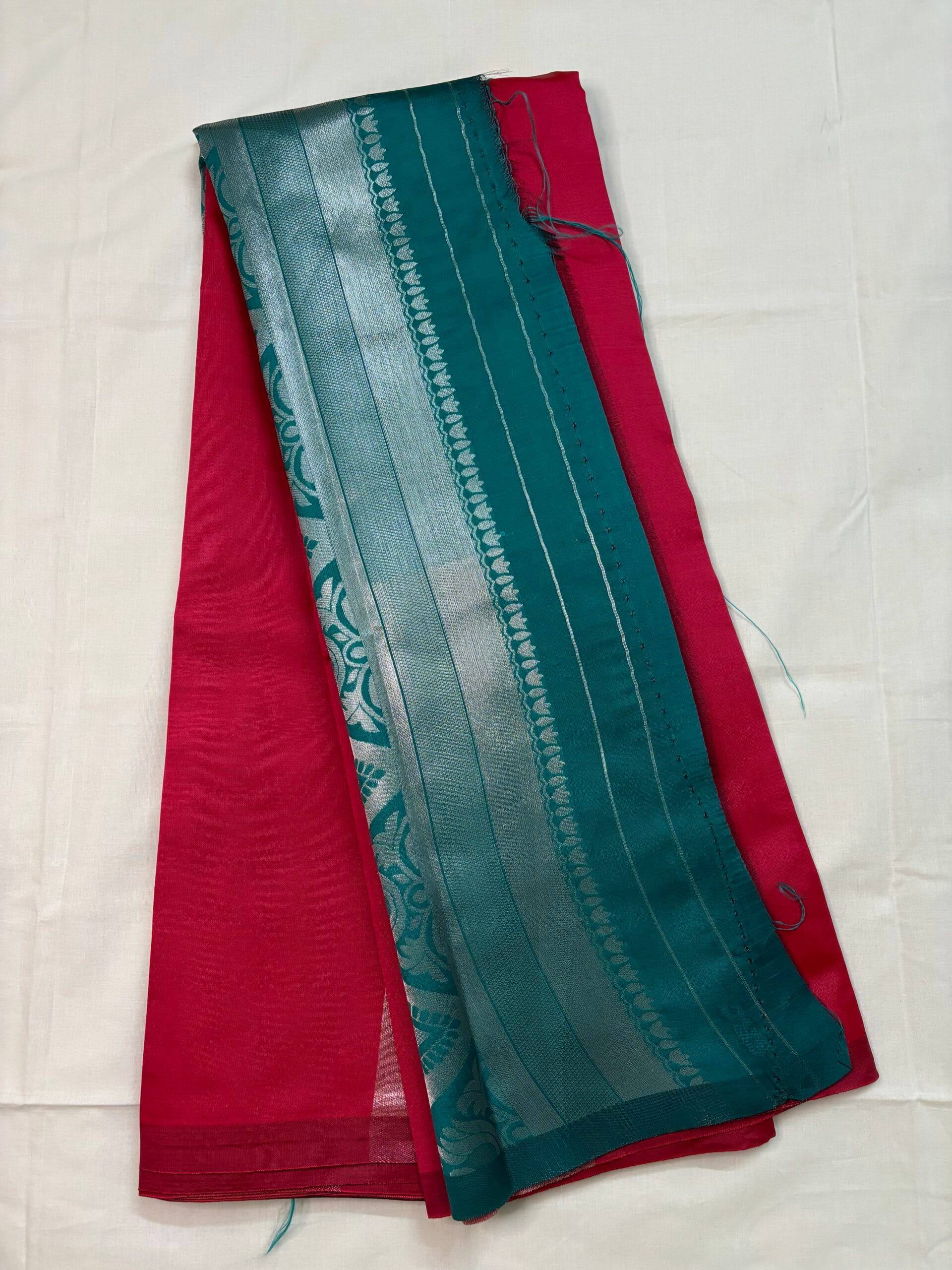 Tomato red borderless silk saree